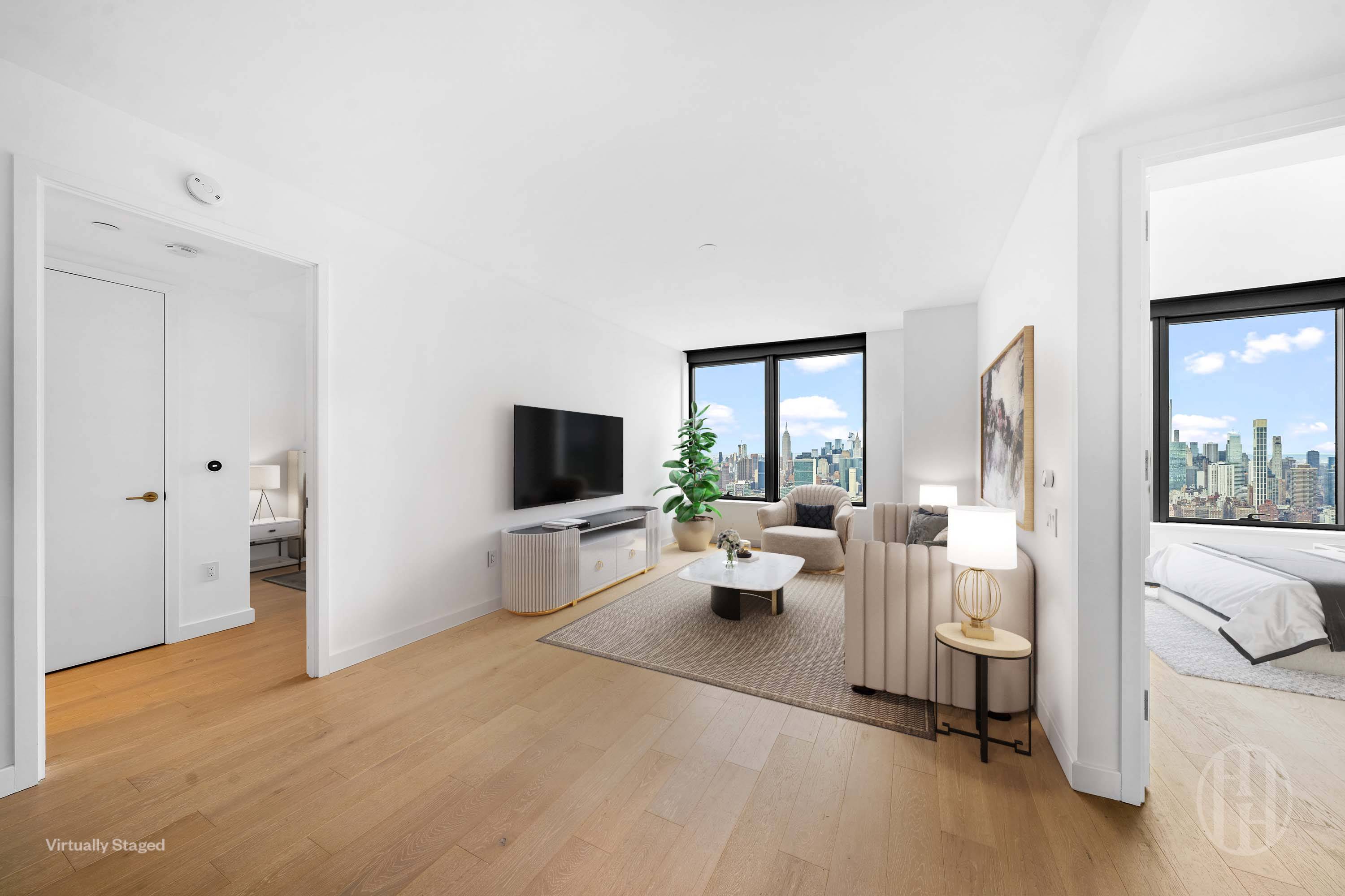 3 Court Square, Unit 5601 Queens, NY 11101 - Photo 3 of 20 a living room with furniture and a flat screen tv