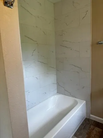 a bathroom with a bathtub
