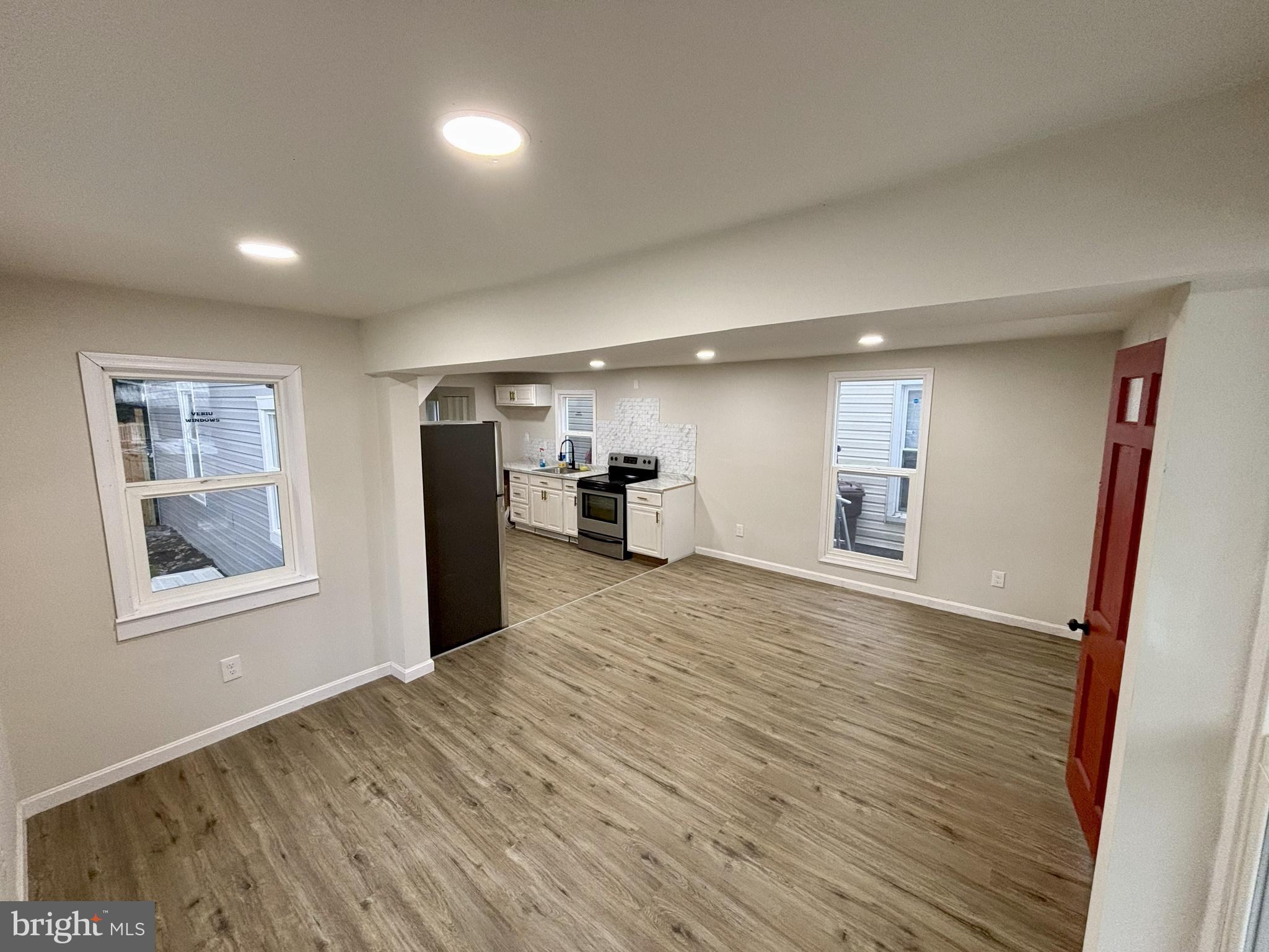 802 Fairmount Avenue Cambridge, MD 21613 - Photo 3 of 16 a view of empty room with wooden floor