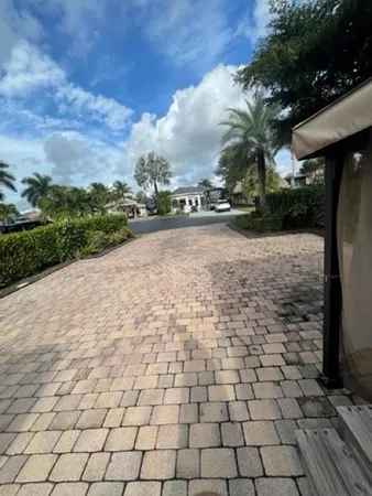 a view of a pathway both side of yard