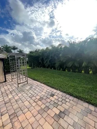 a view of a garden with a bench