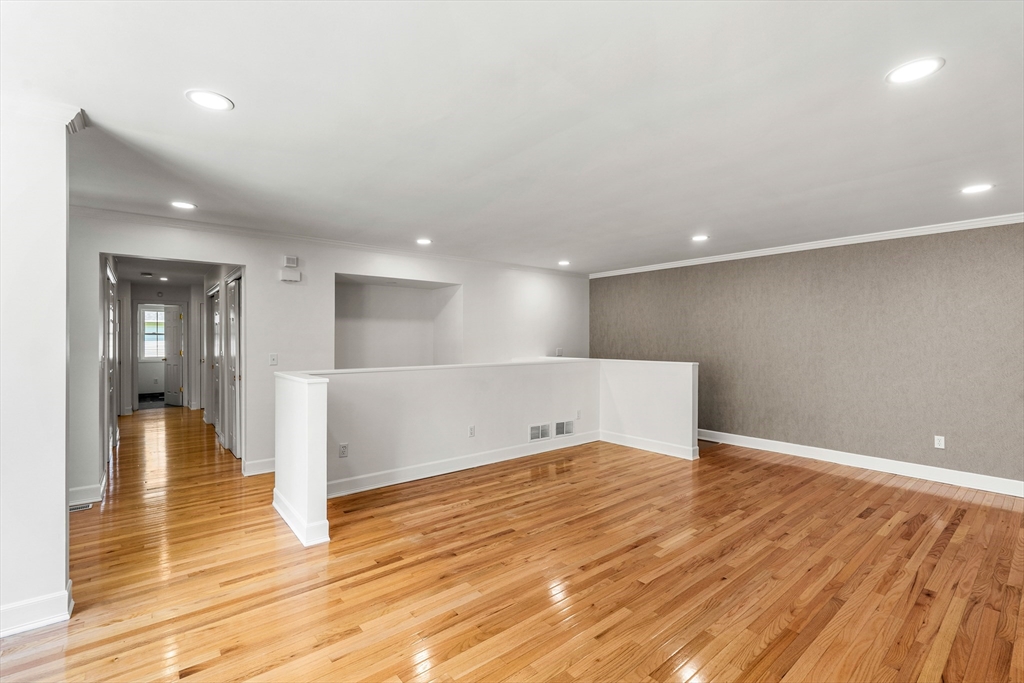 5 Marsden Court Seekonk, MA 02771 - Photo 5 of 39 a view of empty room with wooden floor