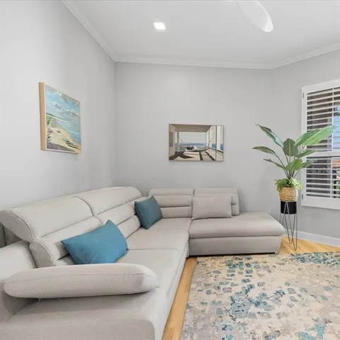 a living room with furniture and a couch