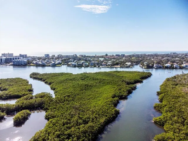 a view of a lake with a city