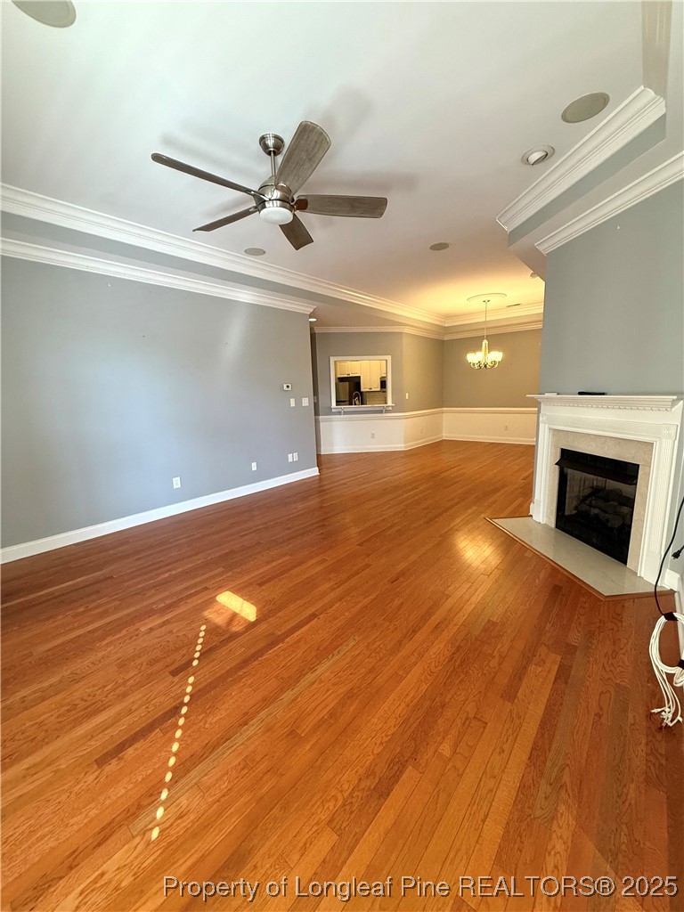 2661 Lockwood Road, Unit 103 Fayetteville, NC 28303 - Photo 15 of 26 a view of empty room with wooden floor and fan