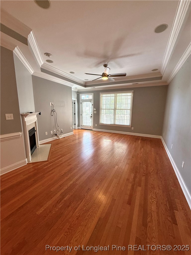 2661 Lockwood Road, Unit 103 Fayetteville, NC 28303 - Photo 2 of 26 a view of an empty room with wooden floor and a window