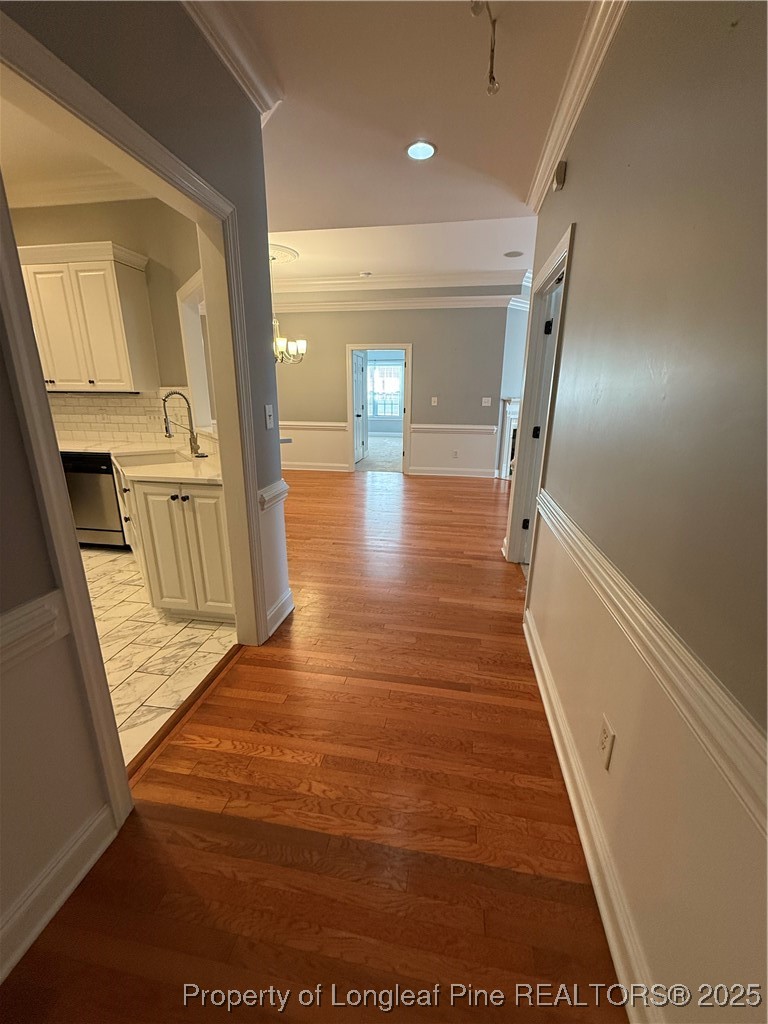 2661 Lockwood Road, Unit 103 Fayetteville, NC 28303 - Photo 6 of 26 a view of a hallway with wooden floor