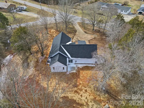 a top view of a house with a yard