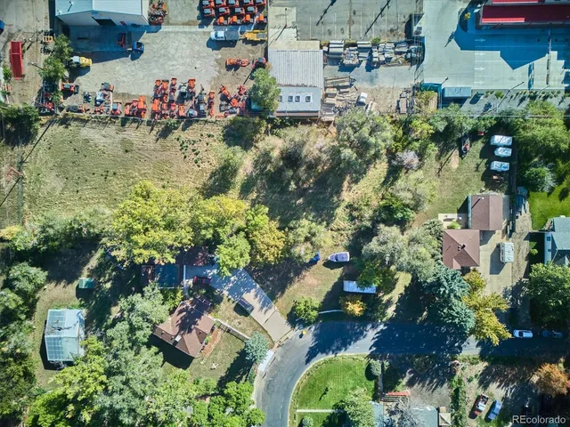 an aerial view of residential house with outdoor space