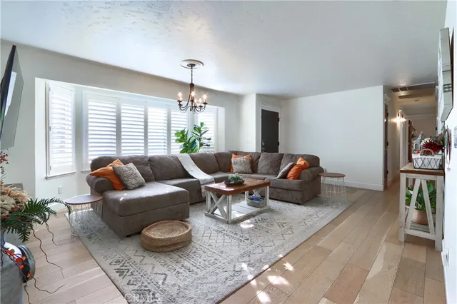 a kitchen with stainless steel appliances granite countertop a refrigerator stove and sink