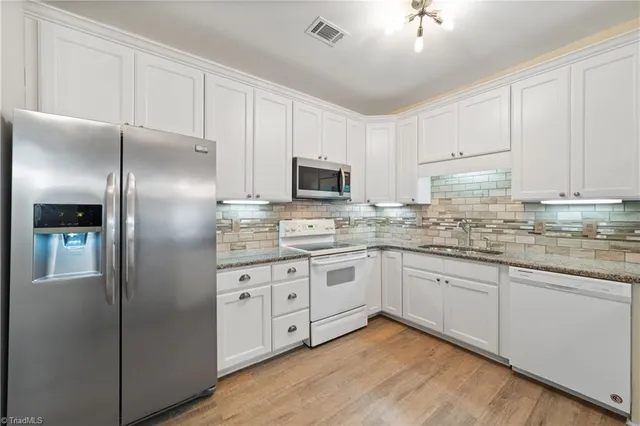 $219,900 | 6901 Hanesbrook Circle, Unit 102, Clemmons, NC 27012