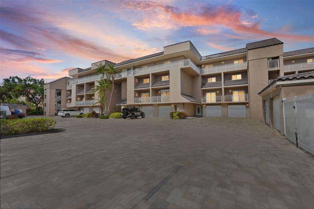 936 Pinellas Bayway South, Unit T5 Tierra Verde, FL 33715 - Photo 2 of 38 a view of residential houses with city street