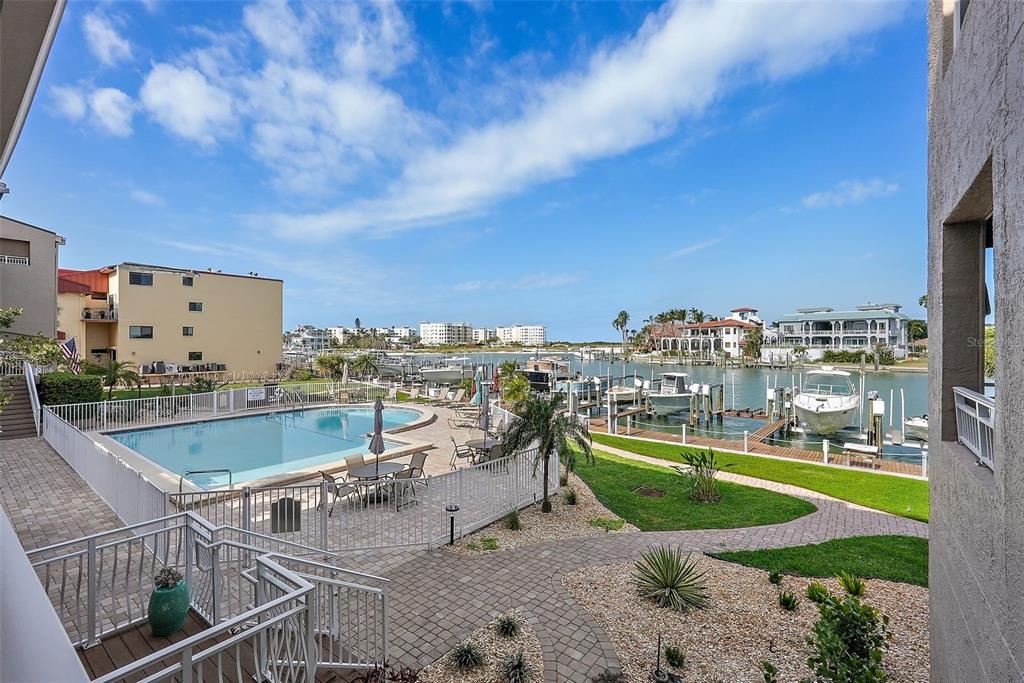 936 Pinellas Bayway South, Unit T5 Tierra Verde, FL 33715 - Photo 24 of 38 a view of a city with swimming pool