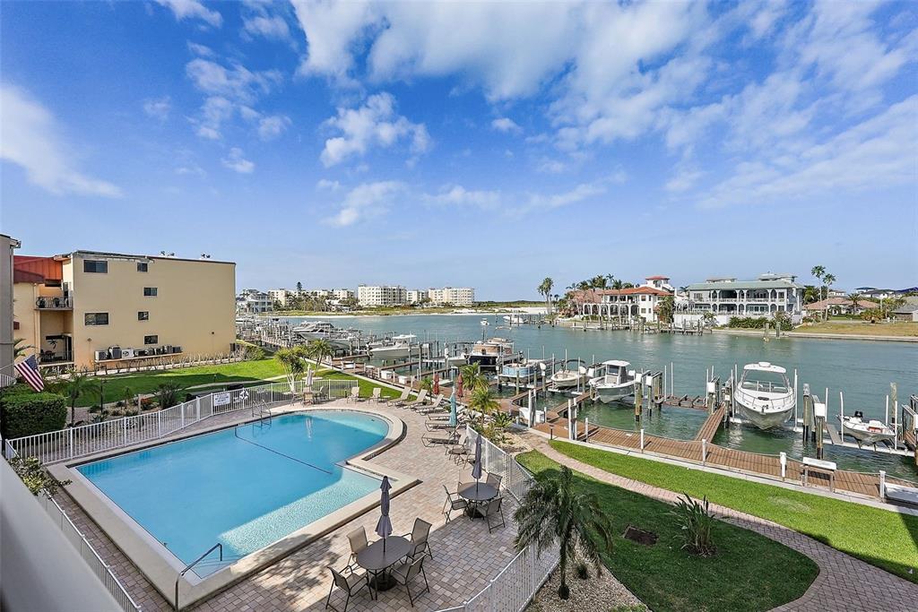 936 Pinellas Bayway South, Unit T5 Tierra Verde, FL 33715 - Photo 25 of 38 a view of a city with lawn chairs