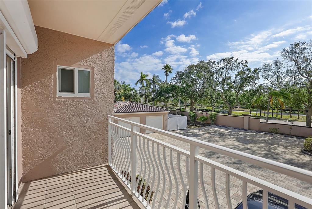 936 Pinellas Bayway South, Unit T5 Tierra Verde, FL 33715 - Photo 37 of 38 a view of a balcony with wooden floor