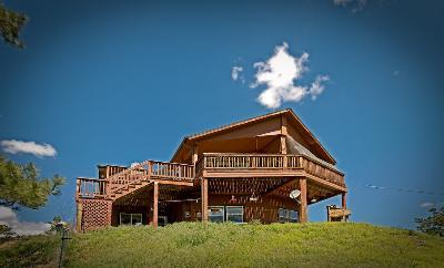 23597 Inca Road Indian Hills, CO 80454 - Photo 1 of 1 a front view of a house with a yard