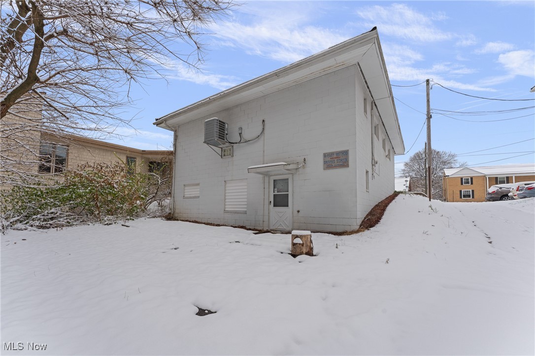 1817 Fulton Road Northwest Canton, OH 44709 - Photo 5 of 25 View of snow covered back of property
