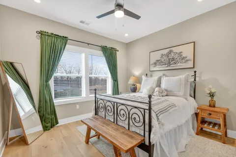 a bedroom with a bed and a closet