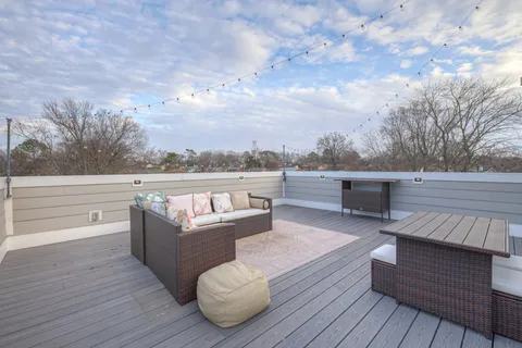 a view of a room with drop ceiling fan
