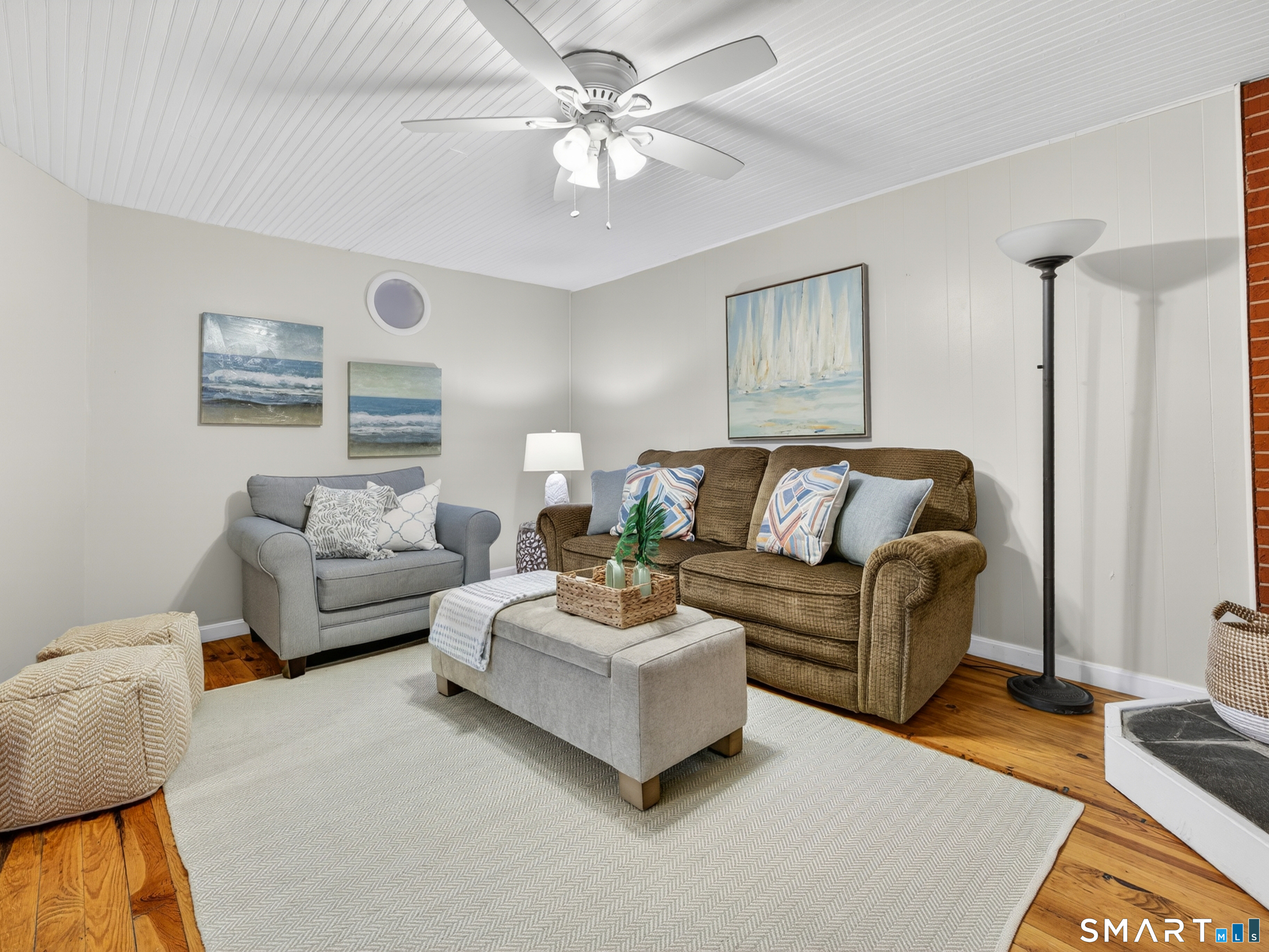 31 Old Colony Road Old Lyme, CT 06371 - Photo 10 of 38 a living room with furniture and a couch