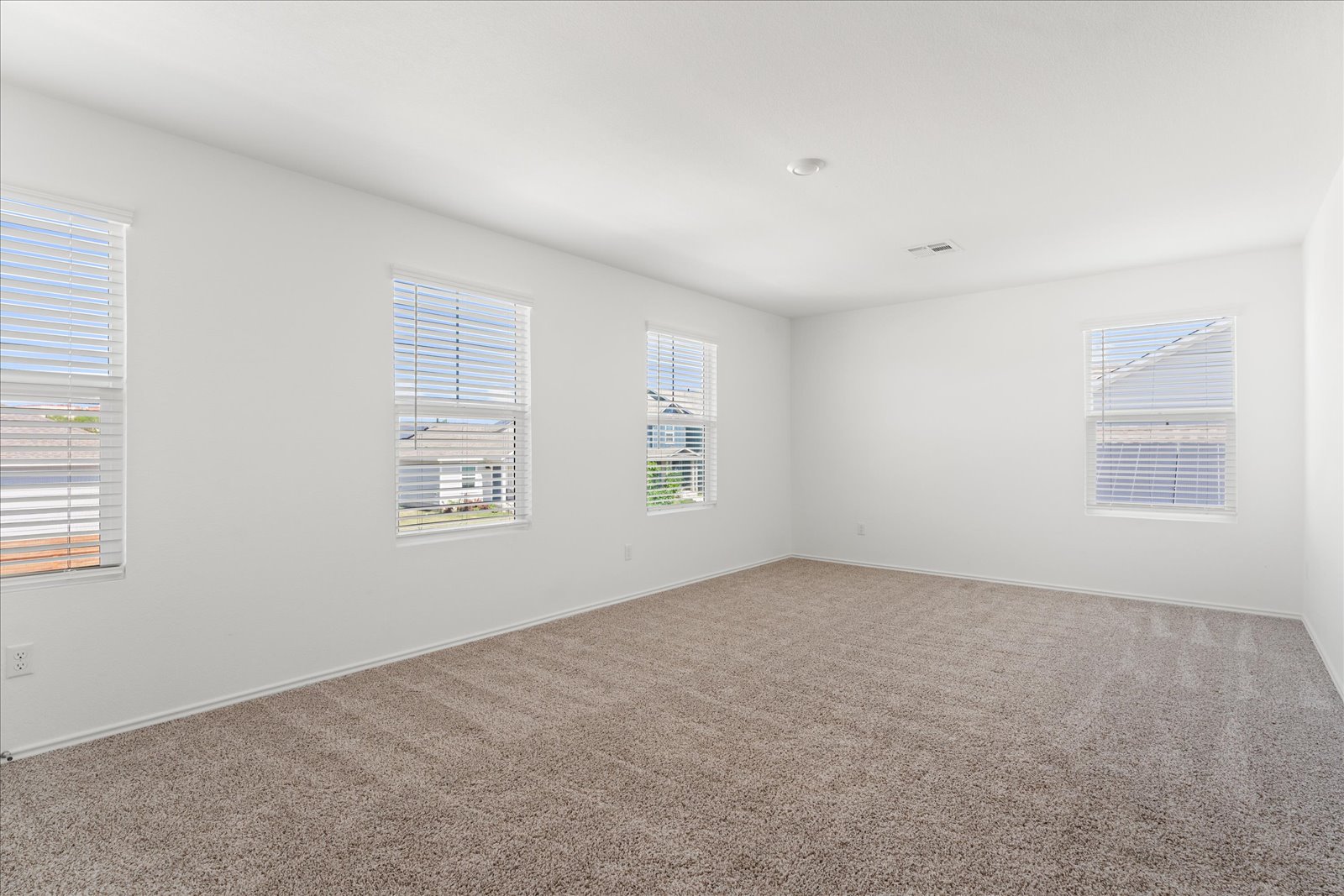 905 Powell Kyle, TX 78640 - Photo 24 of 37 an empty room with windows