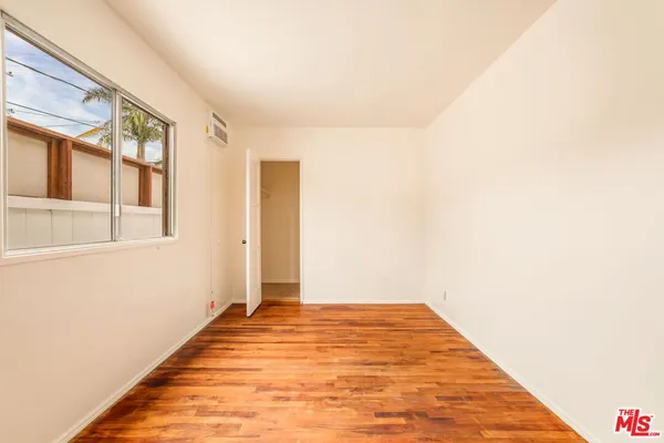 a view of a big room with wooden floor