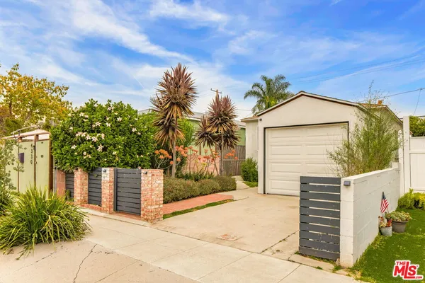 a house view with a garden space