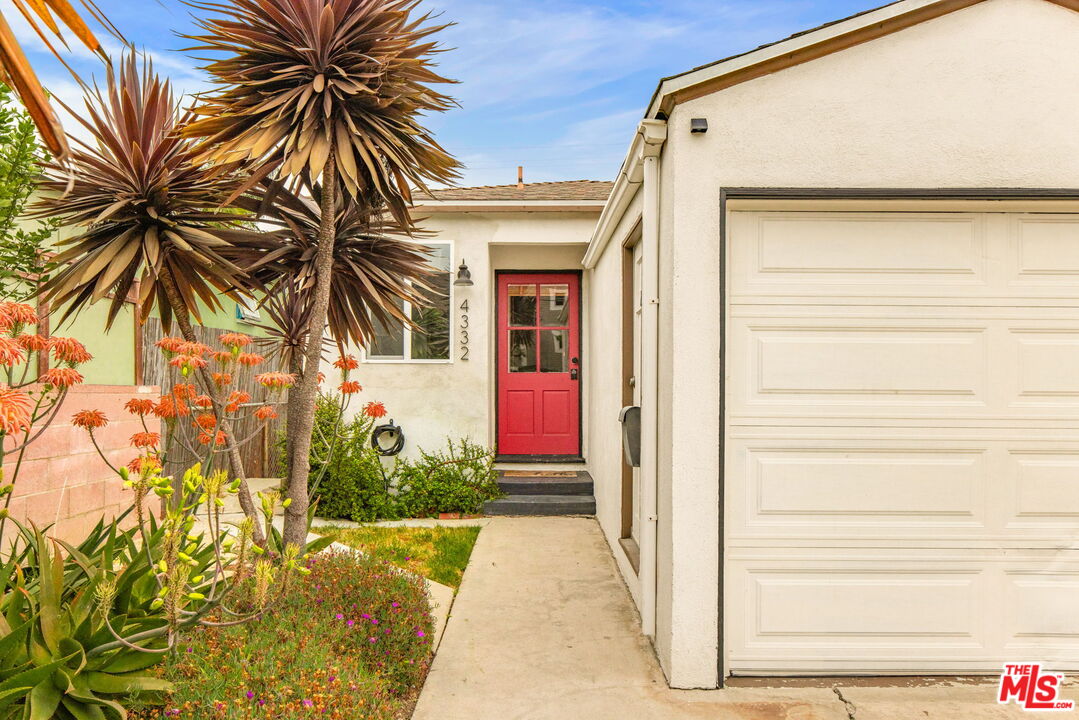 4332 Alla Road Los Angeles, CA 90066 - Photo 3 of 25 a front view of a house with a yard