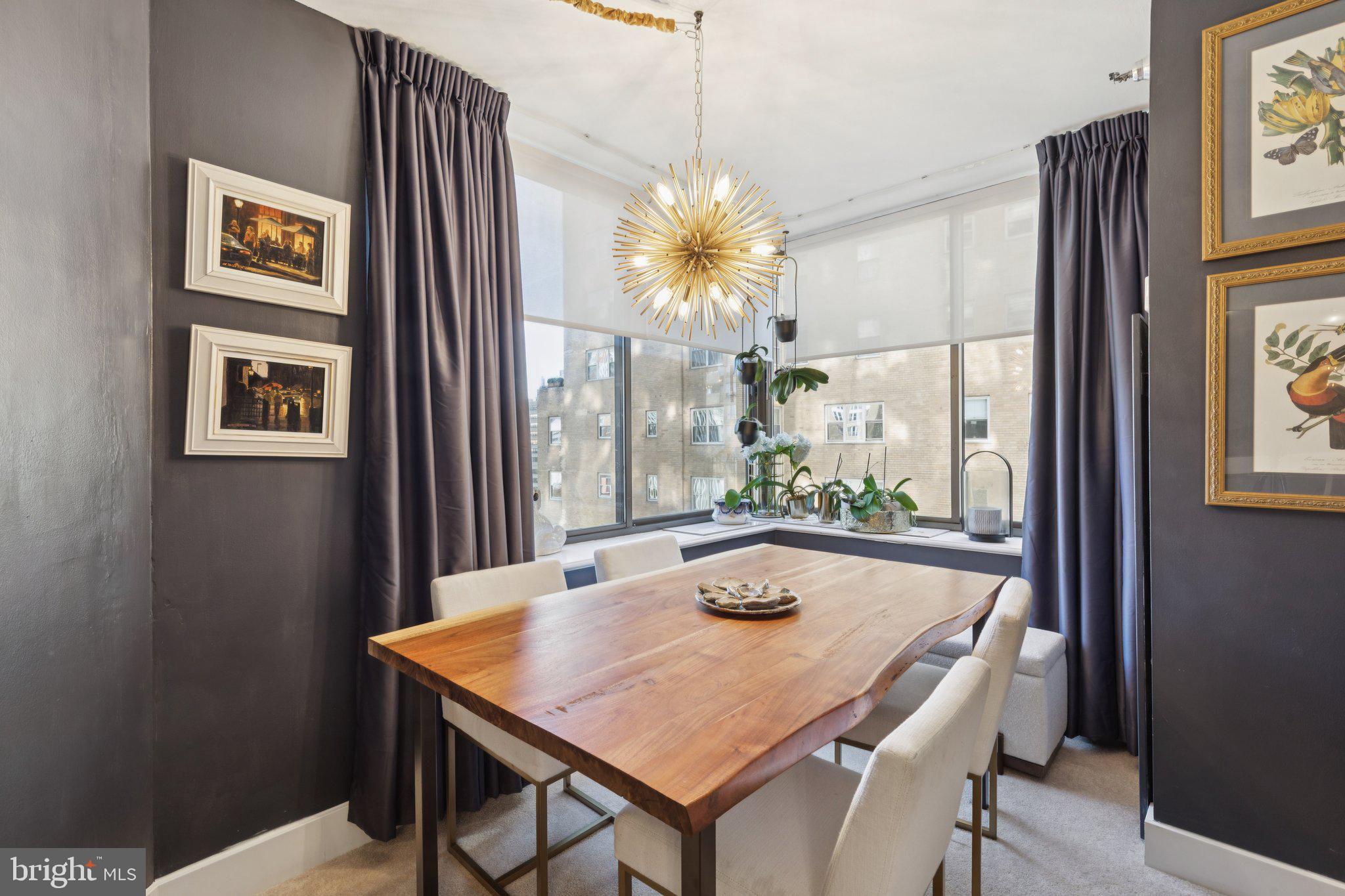 202 West Rittenhouse Square, Unit 1409 Philadelphia, PA 19103 - Photo 4 of 39 a view of a dining room with furniture and window