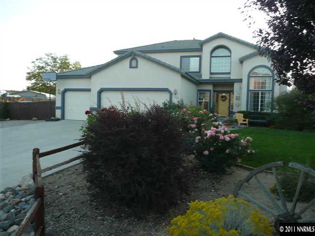 737 Gold River Court Reno, NV 89521 - Photo 1 of 1 a front view of a house with garden