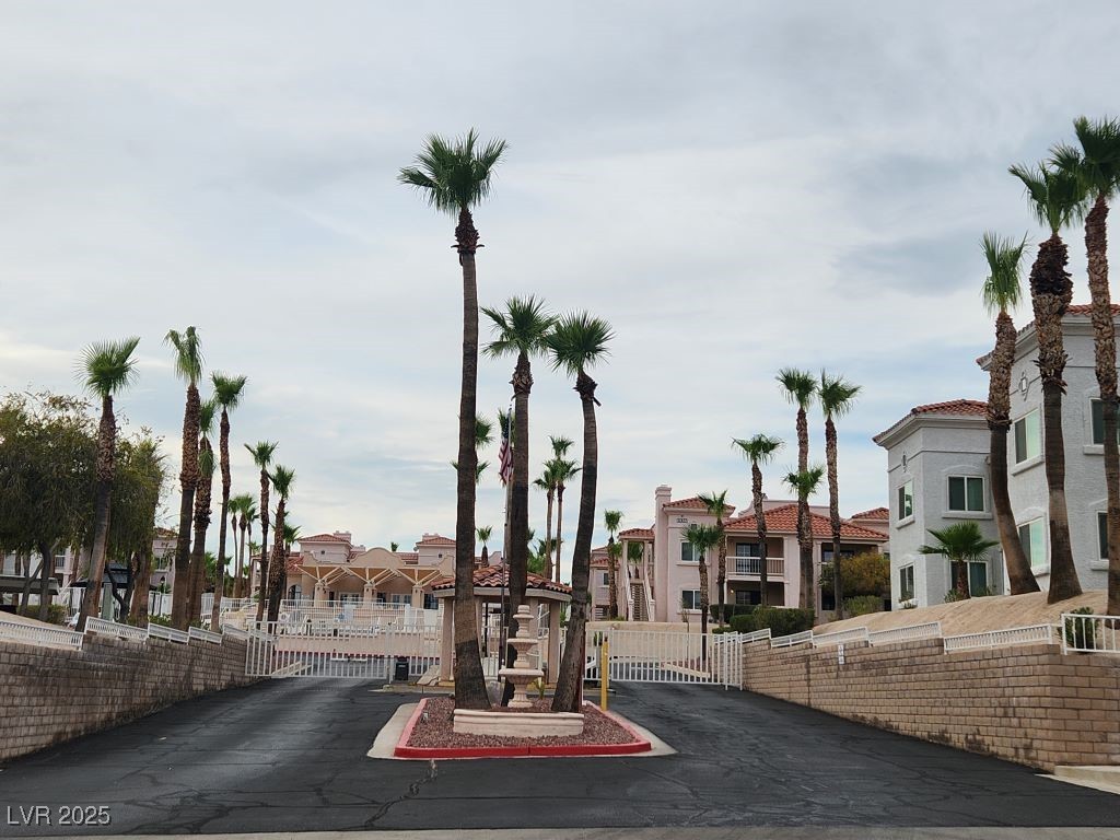 1964 Las Palmas Lane, Unit 141 Laughlin, NV 89029 - Photo 1 of 12 View of road with a gate, a gated entry, and a residential view