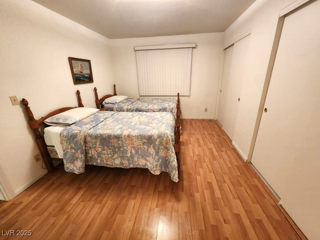1964 Las Palmas Lane, Unit 141 Laughlin, NV 89029 - Photo 4 of 12 Bedroom with light wood finished floors