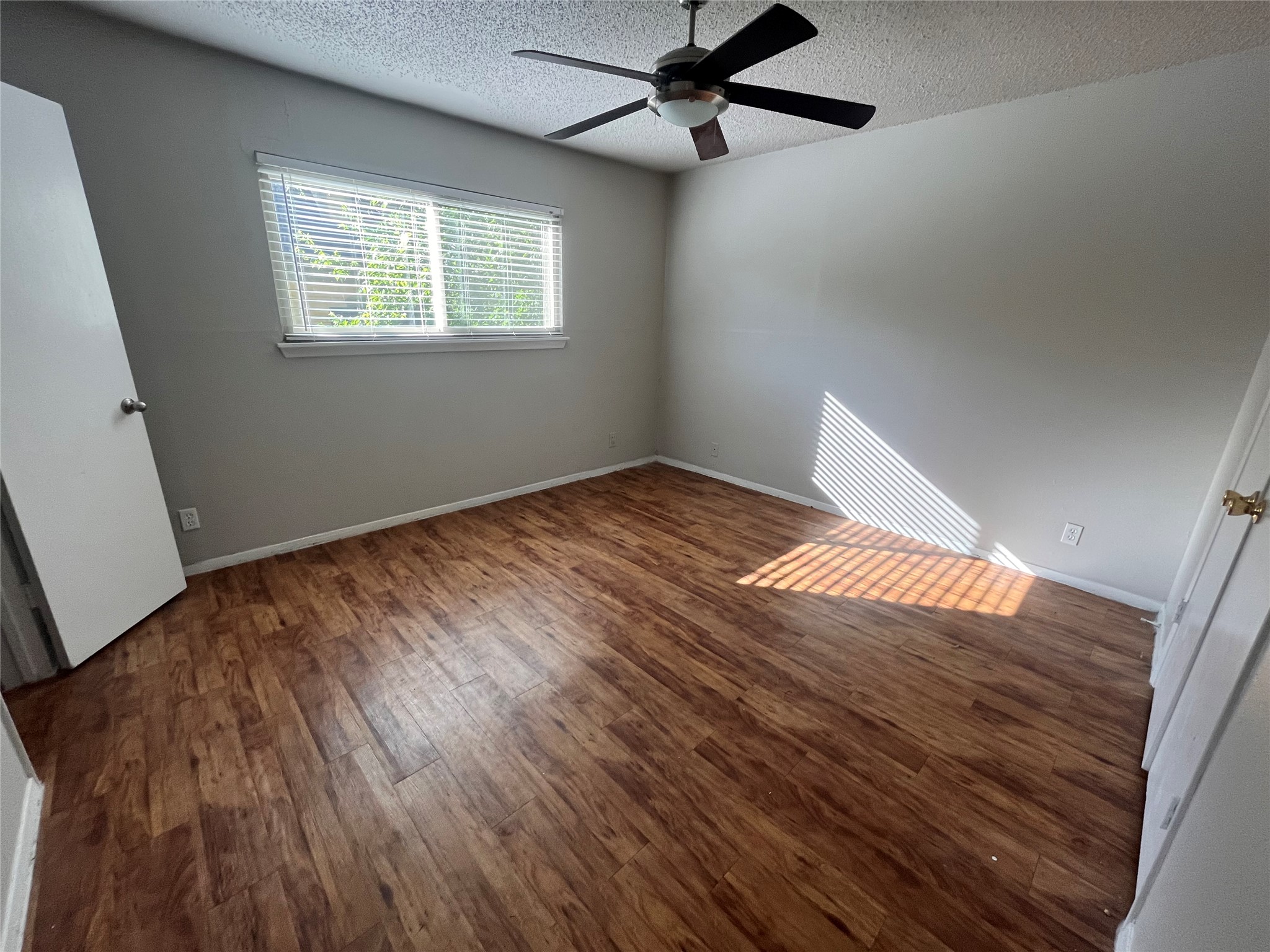 1202 Newning Avenue, Unit 207 Austin, TX 78704 - Photo 11 of 17 a view of an empty room and window