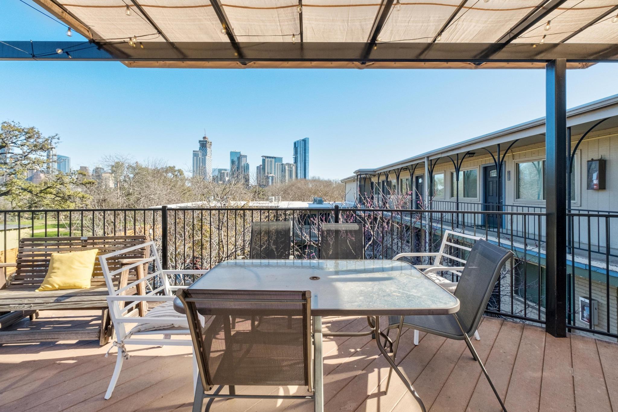 1202 Newning Avenue, Unit 207 Austin, TX 78704 - Photo 14 of 17 a view of a balcony with furniture