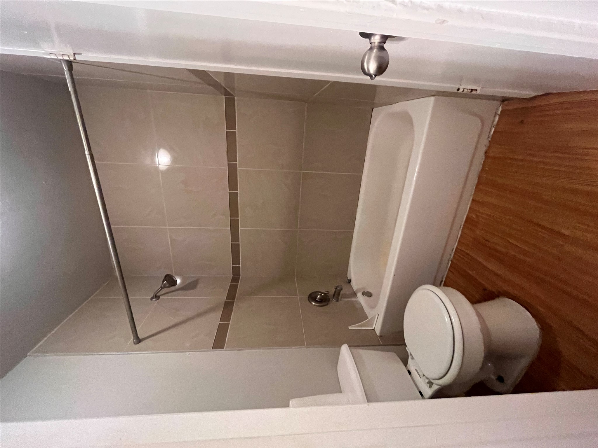 1202 Newning Avenue, Unit 207 Austin, TX 78704 - Photo 10 of 17 a bathroom with a toilet and a shower