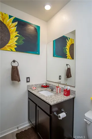 a spacious bedroom with a bed and a window