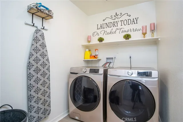 a view of a patio filled with furniture and garden
