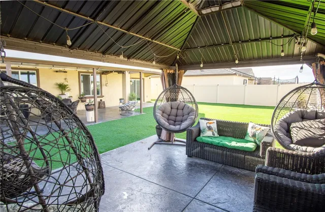 an aerial view of a house with a terrace patio