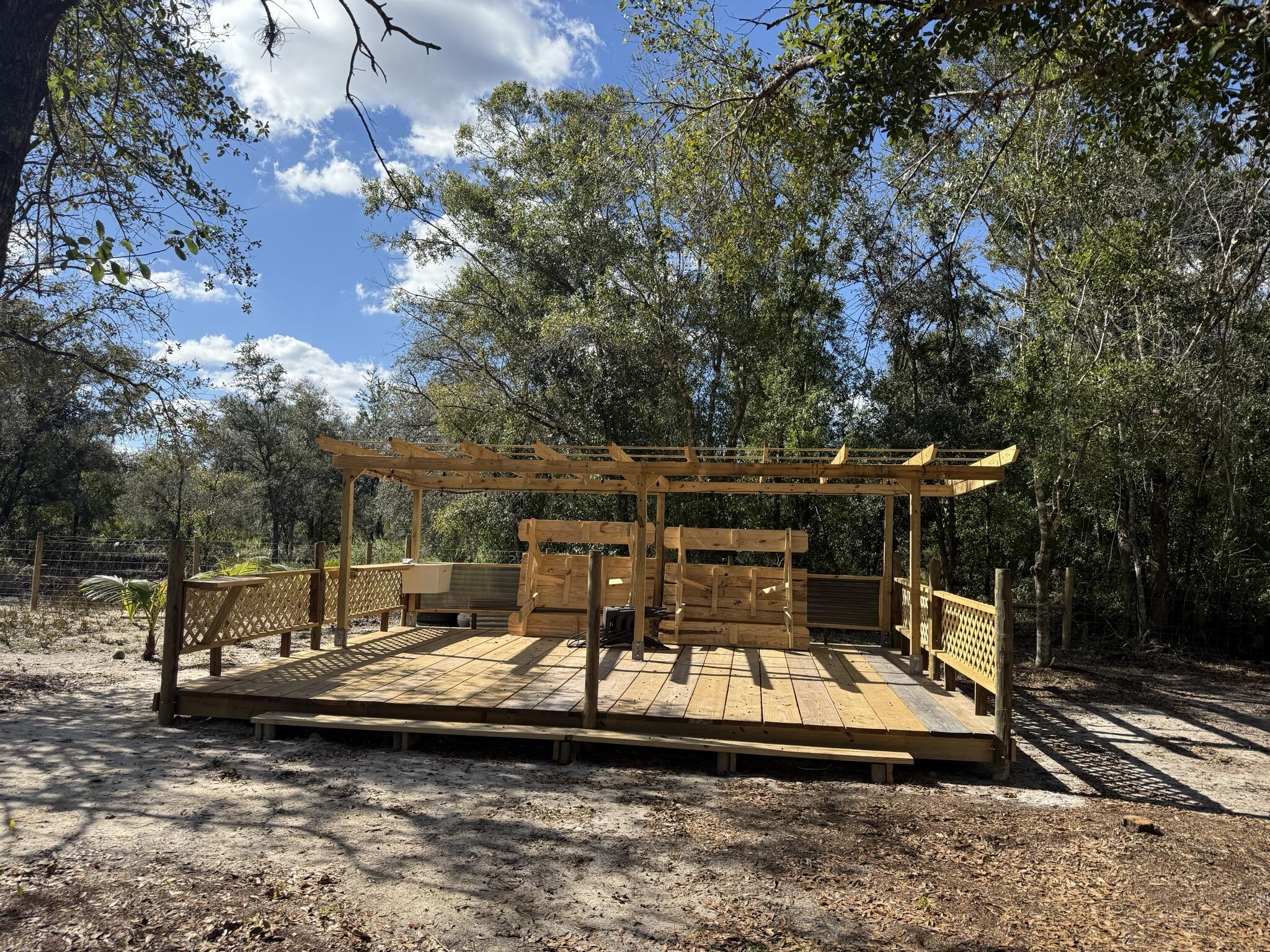 17618 Northwest 286th Street Okeechobee, FL 34972 - Photo 5 of 17 a view of swimming pool with chairs