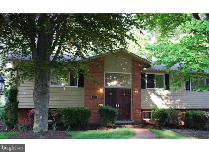 5529 Callander Drive Springfield, VA 22151 - Photo 1 of 30 a front view of a house with garden