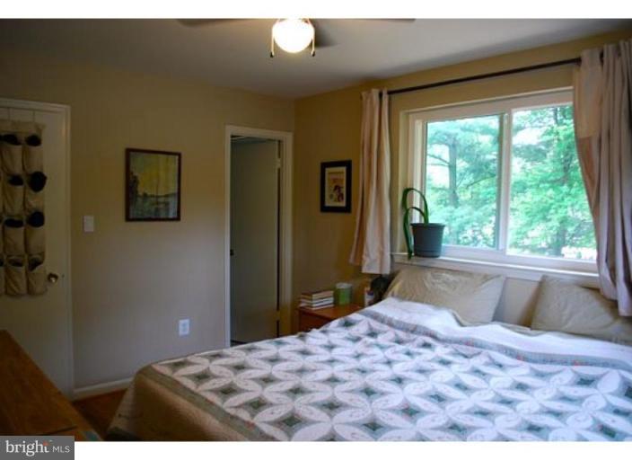 5529 Callander Drive Springfield, VA 22151 - Photo 10 of 30 a bedroom with a bed and a large window