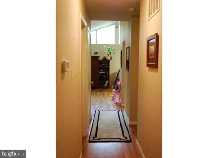 5529 Callander Drive Springfield, VA 22151 - Photo 17 of 30 a view of a hallway with a white walls