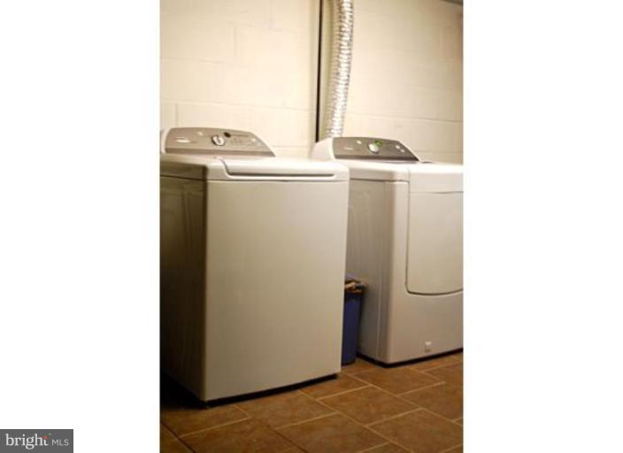 5529 Callander Drive Springfield, VA 22151 - Photo 21 of 30 a utility room with dryer and washer