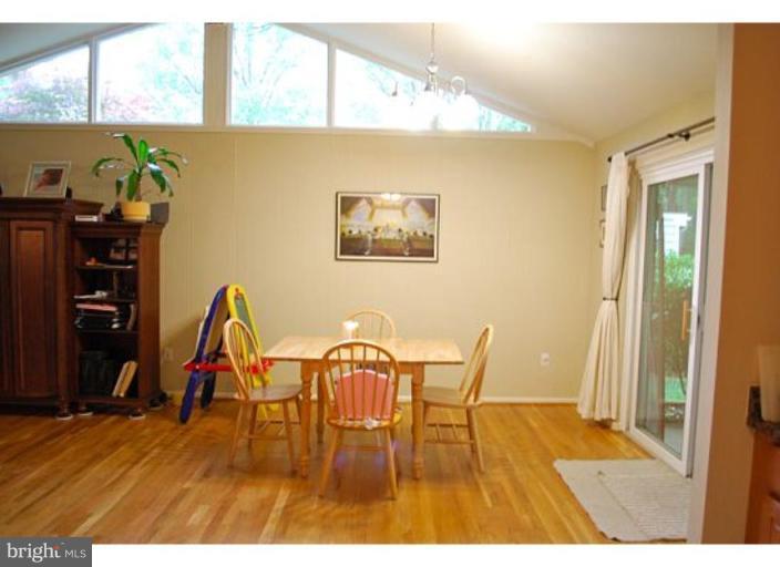 5529 Callander Drive Springfield, VA 22151 - Photo 5 of 30 a view of a dining room with furniture and wooden floor