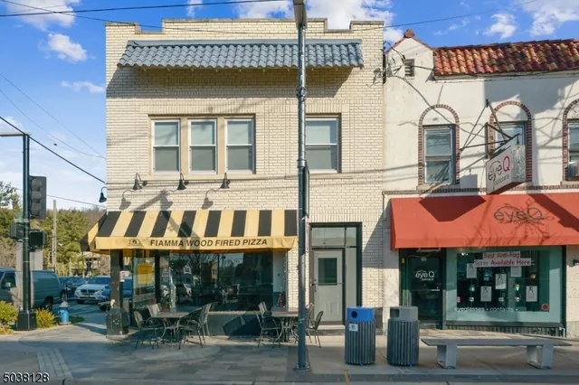 a view of a building with a retail shops