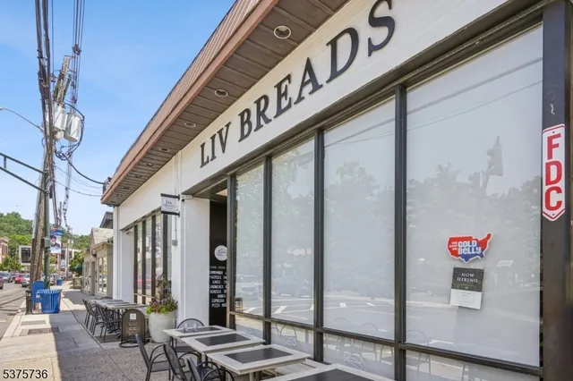 a cafe on the corner of the street