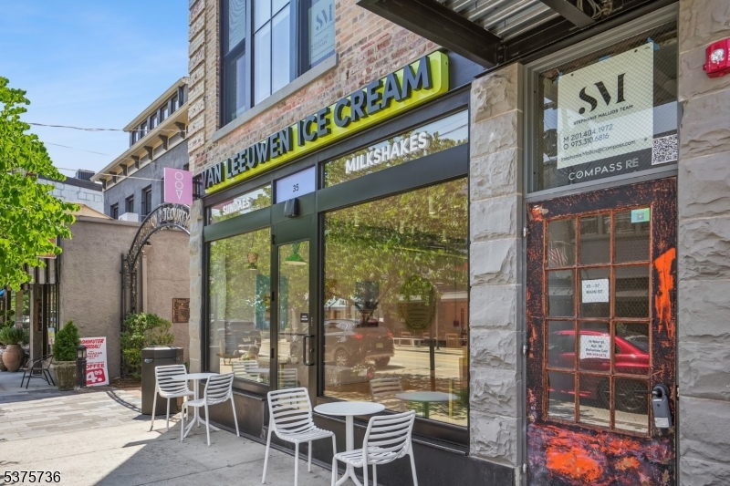 34 Main Street Millburn, NJ 07041 - Photo 21 of 23 a cafe on the corner of the street