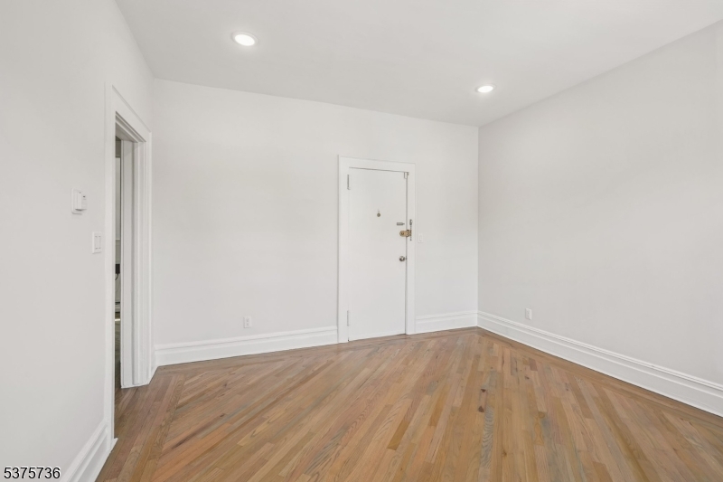 34 Main Street Millburn, NJ 07041 - Photo 3 of 23 a view of room with wooden floor