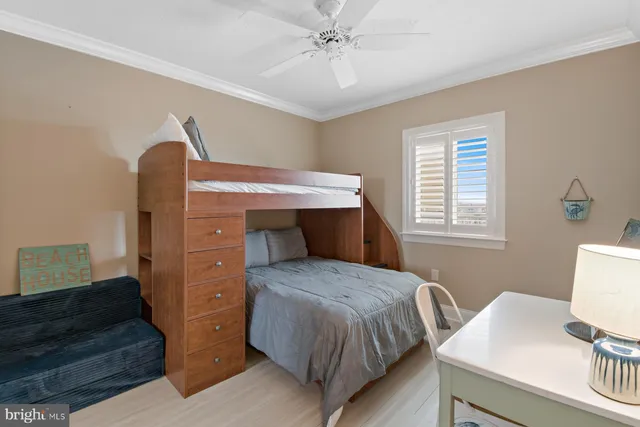 a bedroom with a bed and a table in it