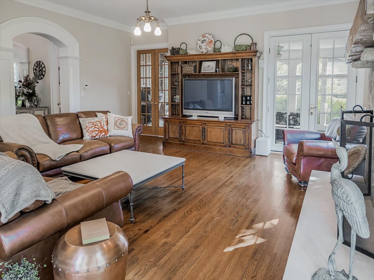 8010 Greenbriar Court Burr Ridge, IL 60527 - Photo 14 of 57 a living room with furniture and a fireplace